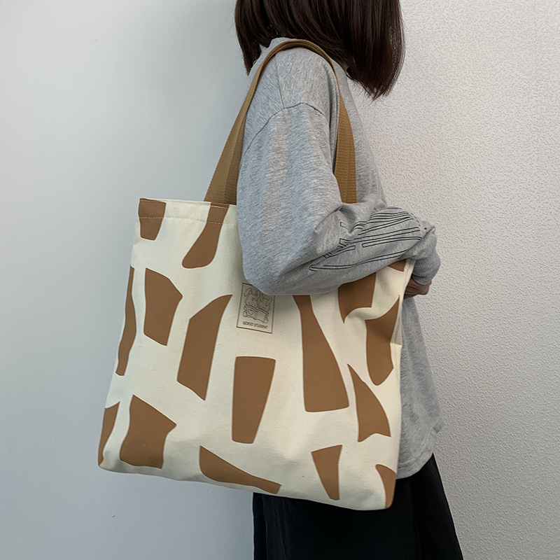 Tela da donna monospalla per lezione, outfit da studentessa universitaria, stile coreano Instagram con cerniera, design artistico,_voghion.com
