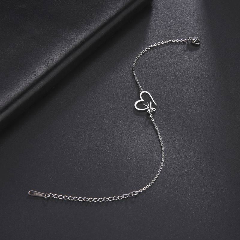 Stainless steel bracelet creative design sense of love hair tool pendant bracelet jewelry_voghion.com