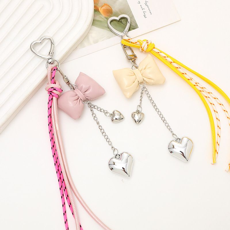 INS Nieuwe leren strik hart tas sleutelhanger ketting enkele gesp kwast hanger accessoire_voghion.com