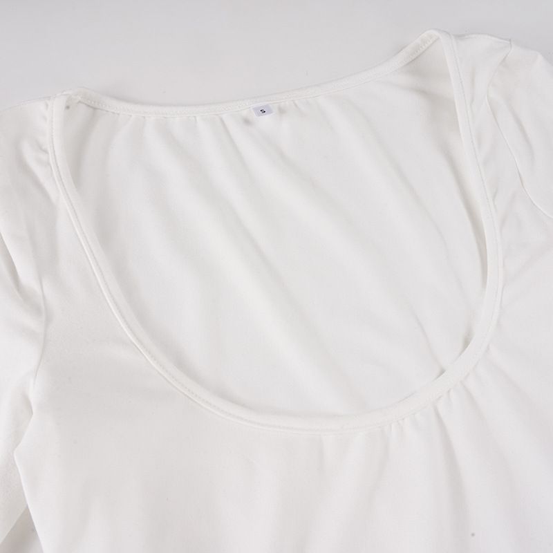 Grenzüberschreitender europäischer und amerikanischer Sport-Look: Zweiteiliger Lagenlook mit Neckholder, eng anliegendem Jumpsuit und U-Ausschnitt._voghion.com