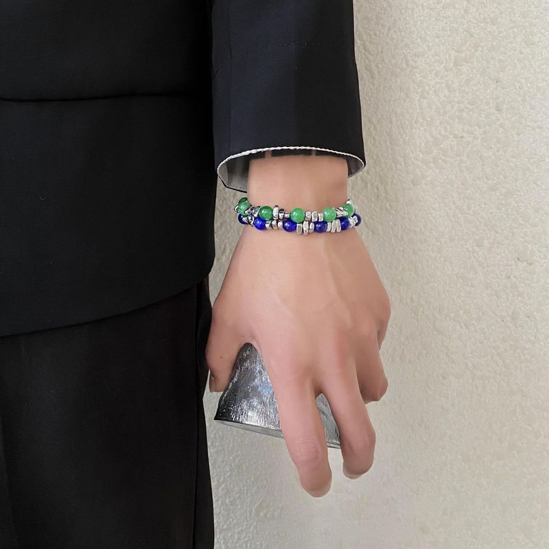 Den senaste omgången av designade kattögonstensarmband skarvade med INS trendiga handtillbehör titanstål obsidian herr- och damarmband_voghion.com