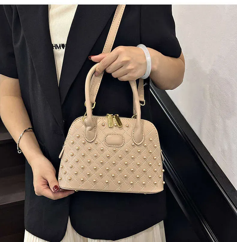 Fashion Designer Shell Bags For Women Elegant Rivet Handbag Versatile Large Capacity Shoulder Crossbody Bag_voghion.com