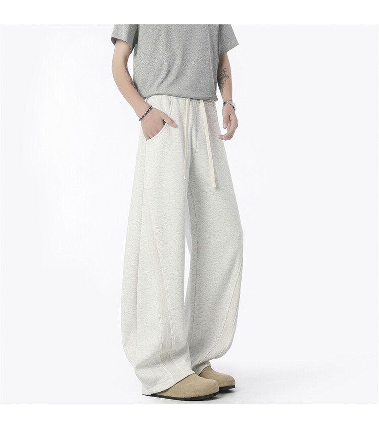 Jogginghose im dekonstruierten, einfarbigen Herrenstil – Cleanfit, lockere, gerade geschnittene Freizeit-Sweathose für Streetwear und den Alltag_voghion.com