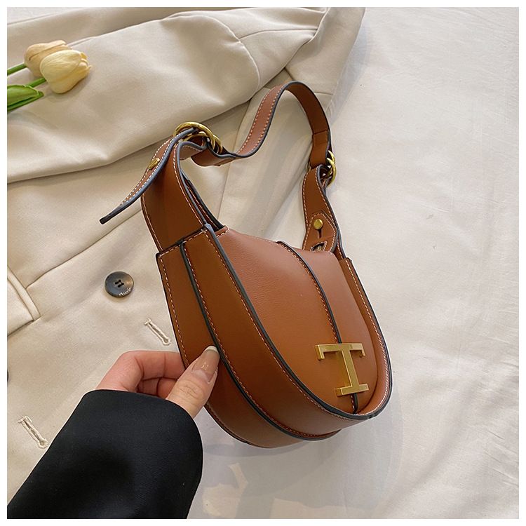 2024 nou geantă semilună din piele naturală geantă de nișă cu jumătate de lună la subrat geantă de șa producătorii de genți de umăr en-gros_voghion.com