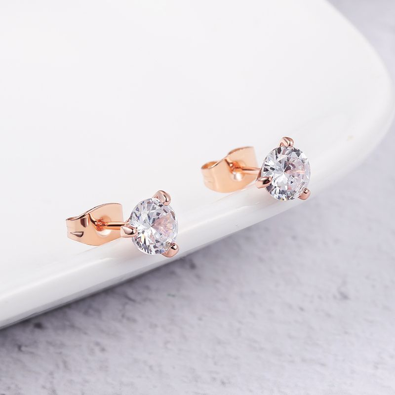 Orecchini unisex semplici e freschi a tre griffe rotondi con diamanti piccoli orecchini_voghion.com