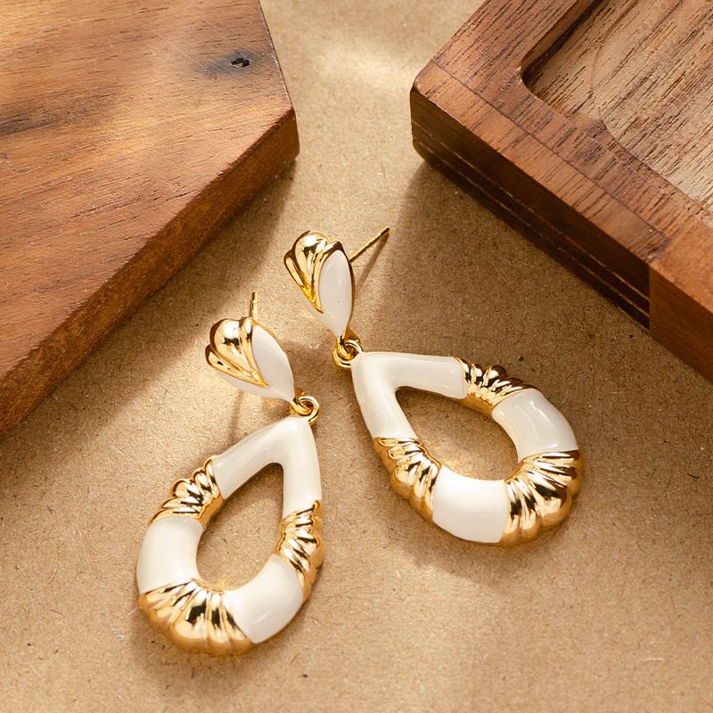 Elegante e lussuoso, stile antico, smalto a goccia, a forma di goccia cava, per donne con un temperamento di nicchia, di alta qualità._voghion.com