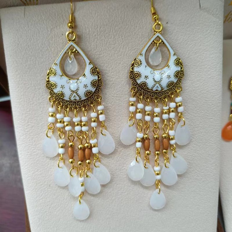 1 paire de boucles d'oreilles pendantes en alliage plaqué avec perles et pampilles style rétro Ig_voghion.com