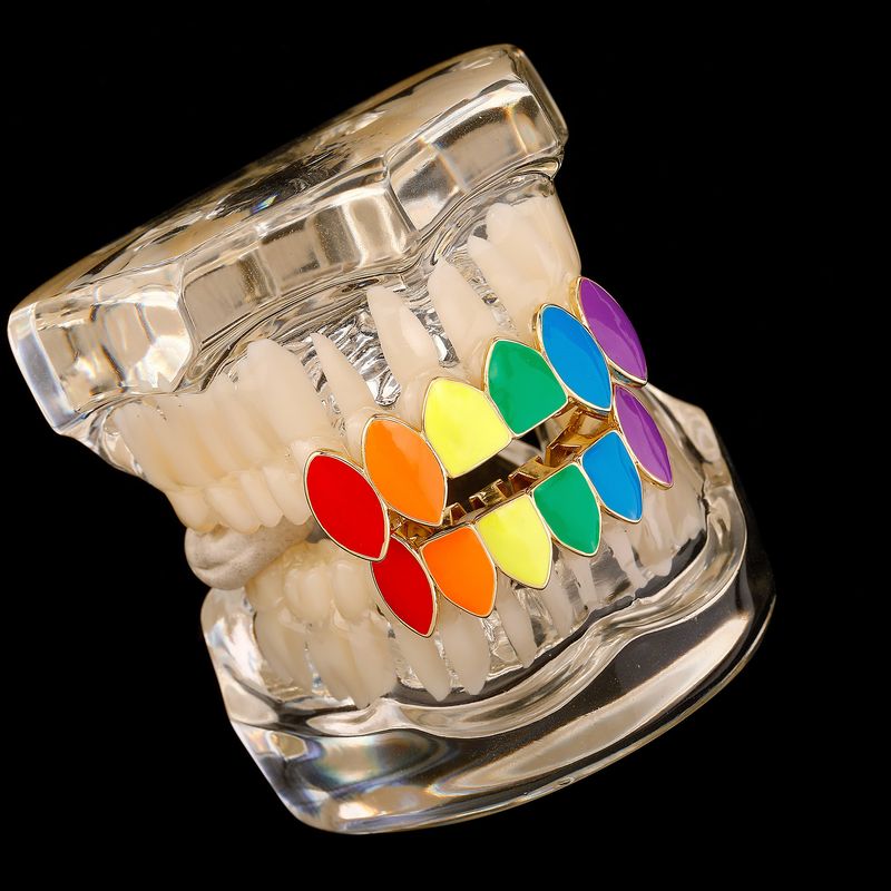 Grillz Hip Hop in oro per uomo e donna - Griglie per denti affilati placcate in oro di alta qualità per Halloween e feste - Zanne dentali colorate e luminose, eleganti e alla moda_voghion.com