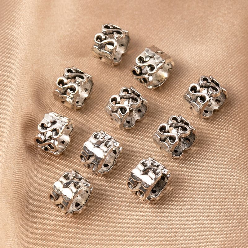 Fermagli per capelli retrò europei e americani, fermagli etnici per chignon con fori traforati, elastici per capelli rotondi in lega, accessori per capelli vintage a forma di serpente con molla a spirale_voghion.com