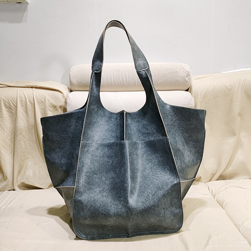 Europäische und Amerikanische Mode Retro 2024 Neue Einfache Große Tasche Weichem Leder Große Kapazität Eine Schulter Handheld Tote frauen tasche_voghion.com