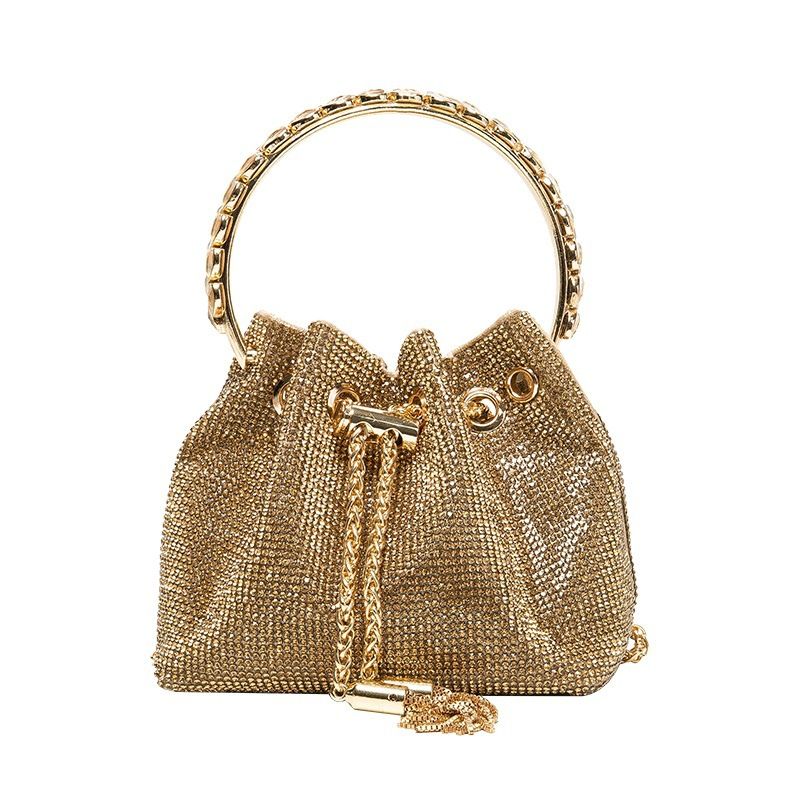 Borsa a secchiello con nappa e perle intarsiate in oro e diamanti, regalo per feste da donna, 2025_voghion.com