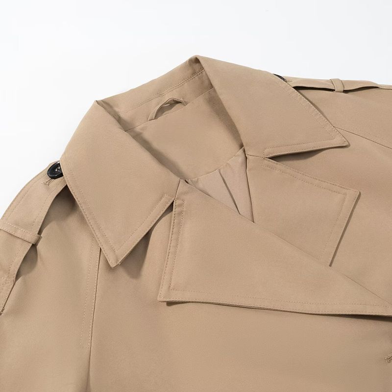 "Abrigo corto oversize de moda para mujer: mezcla ligera de poliéster, estilo casual chic con cinturón y diseño cruzado"_voghion.com