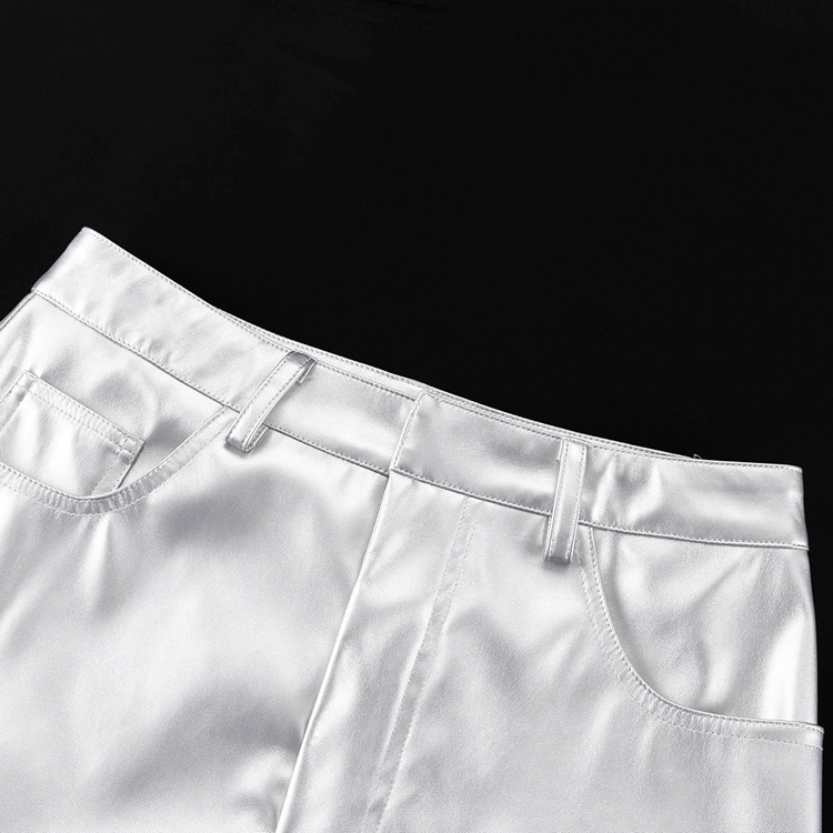 Los nuevos productos de otoño para mujer llegan con una falda plateada delgada a la cadera y una falda de cuero PU._voghion.com