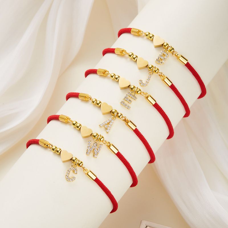 jewelry 26 English Fashion Red Rope Stainless Steel Heart-shaped Letter Pull-out Adjustment Bracelet_voghion.com