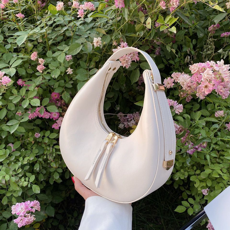 La nuova borsa di nicchia di quest'anno, borsa a mezzaluna a mezzaluna con spalla singola e ascellare di fascia alta da donna_voghion.com