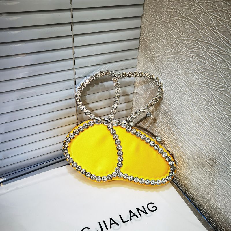 Borsa a mano con pochette da sera lucida con strass e farfalla da donna, 2023_voghion.com