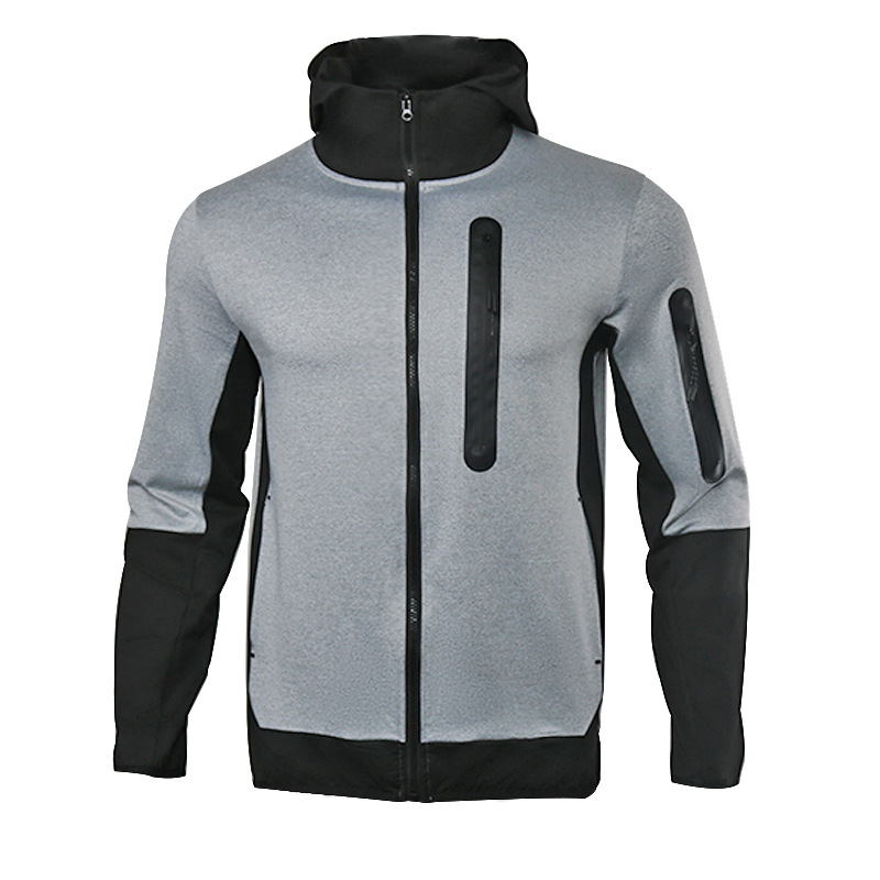 Ein Satz trendiger, lässiger Sport-Herrenanzüge mit Kapuze und farblich passenden Patchwork-Kapuzenpullovern, Jacken und Hosen_voghion.com