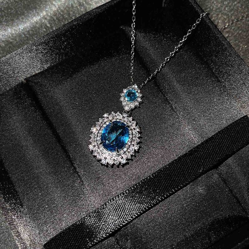 Europäische und amerikanische neue Luxus-Farbschatz-Set mit eingelegtem blauem und gelbem Zirkon, Halskette, Ring, Ohrringe, Anhänger, weiblicher Saphir_voghion.com