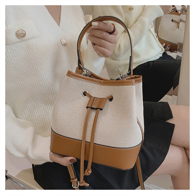 Borsa da donna 2023 Borsa nuova moda Borsa a tracolla Borsa a secchiello portatile in tela cucita con coulisse_voghion.com