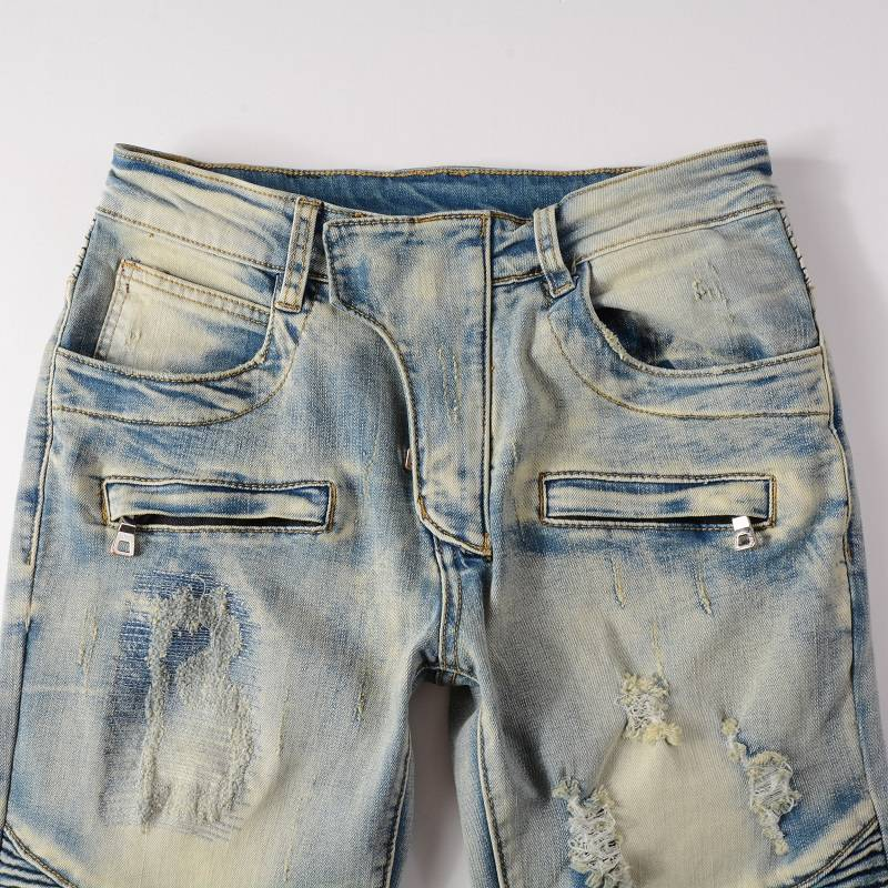 Jean bleu délavé à patchwork de mode Pantalon en denim pour hommes à poches multiples avec fermeture éclair Pantalon de motard déchiré en denim de créateur pour hommes_voghion.com