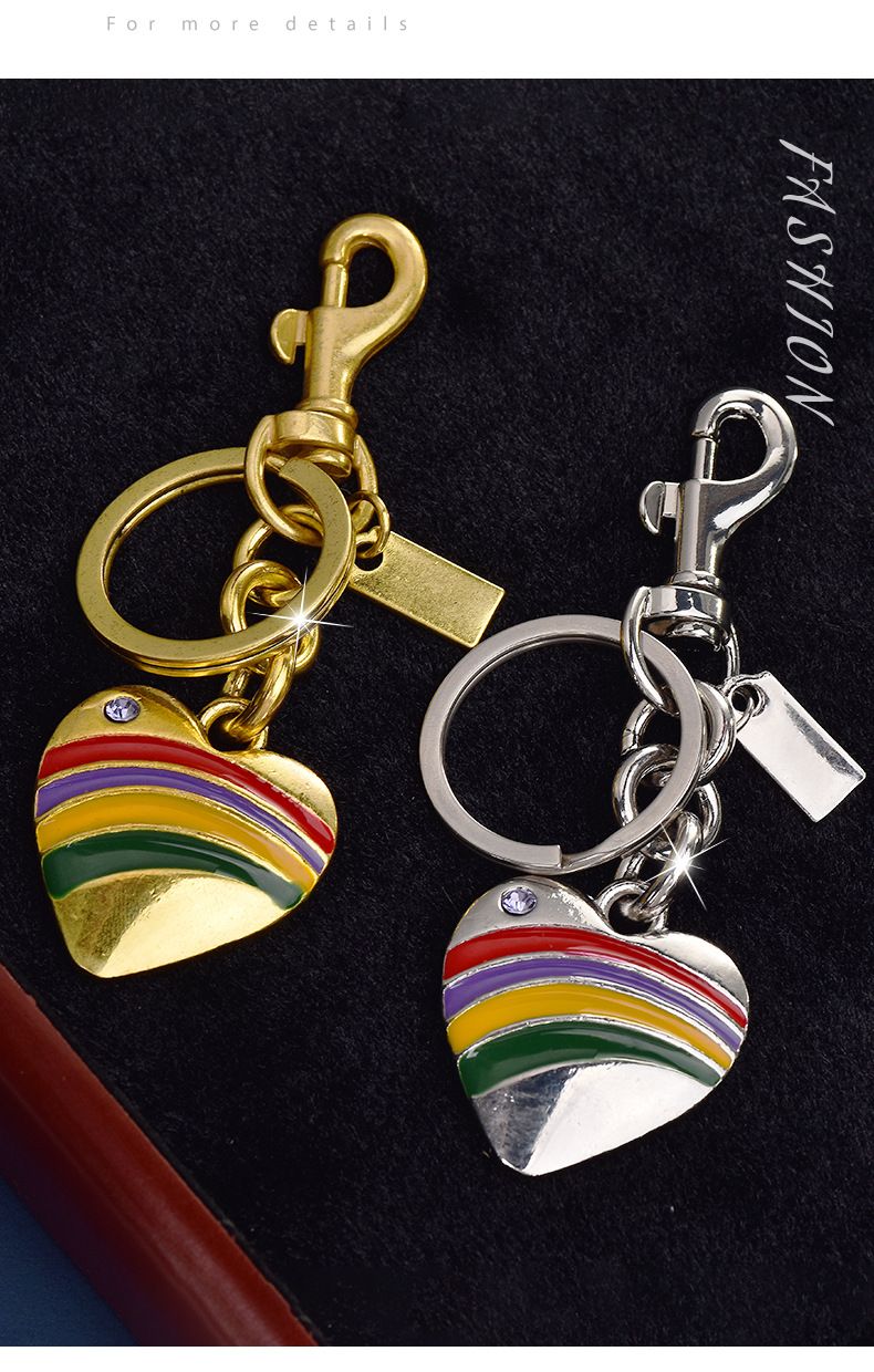 Portachiavi con ciondolo a forma di cuore con ciglia e goccia d'olio, in lega, con arcobaleno, semplice e colorato, per donna_voghion.com