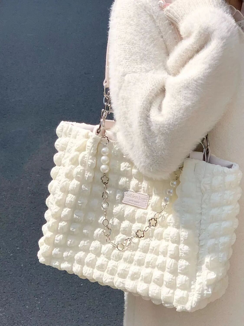 2023 Nuova borsa tote di grande capacità con catena a sbuffo color crema di nicchia, borsa a tracolla portatile morbida e versatile da donna_voghion.com