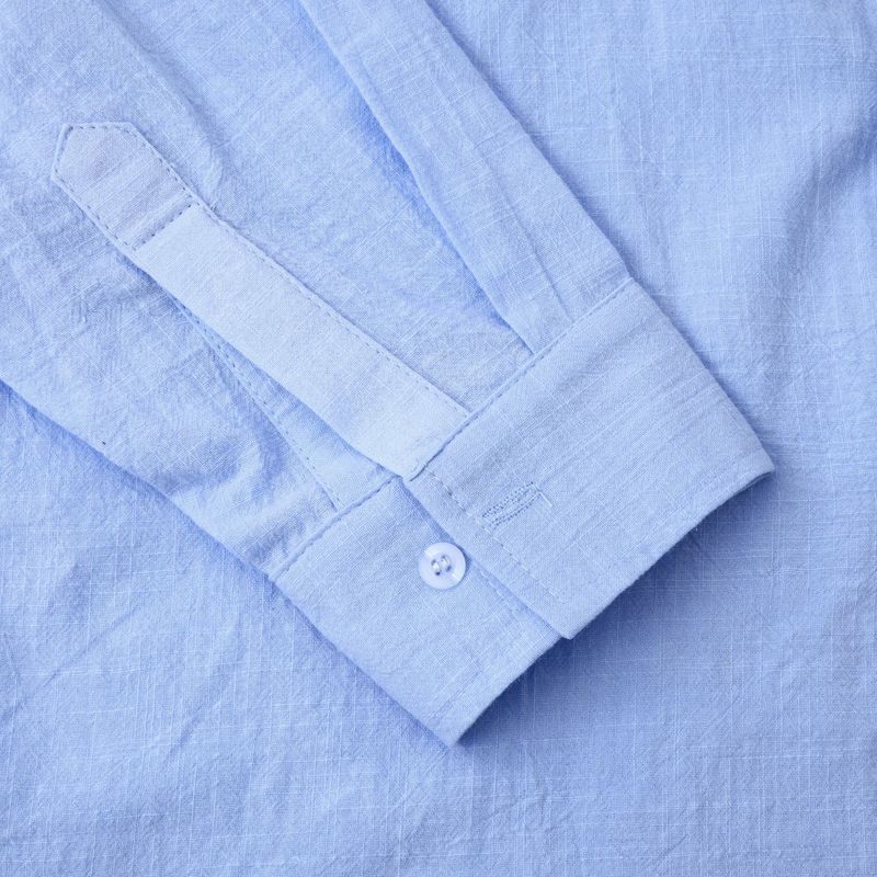 Camicia da uomo ampia a maniche lunghe in cardigan con colletto alla coreana in lino tinta unita_voghion.com