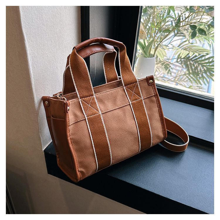 Japan and South Korea Foreign Trade Canvas Bag Women 2023 New Trendy Fashion handbag niche hit color commuting shoulder Messenger bag_voghion.com