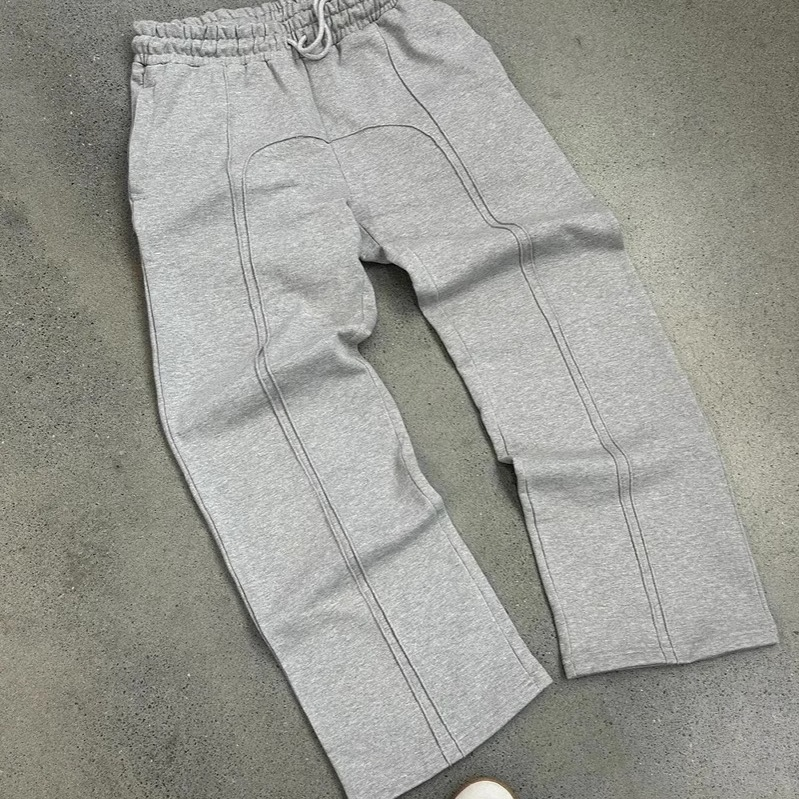 Pantaloni da jogging in pile a vita alta Y2K con coulisse, vestibilità ampia e microelasticizzati per uomo_voghion.com