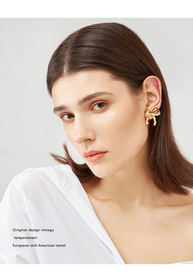 Bogenohrringe Kupfer mit echtem Gold überzogene weibliche Ohrringe Mode Bogen Persönlichkeit weibliche Ohrringe_voghion.com