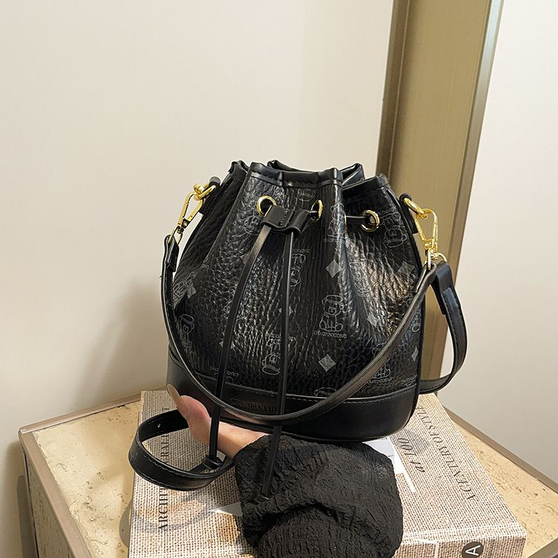 Borsa a tracolla singola con stampa alla moda e secchiello, carina, da donna_voghion.com