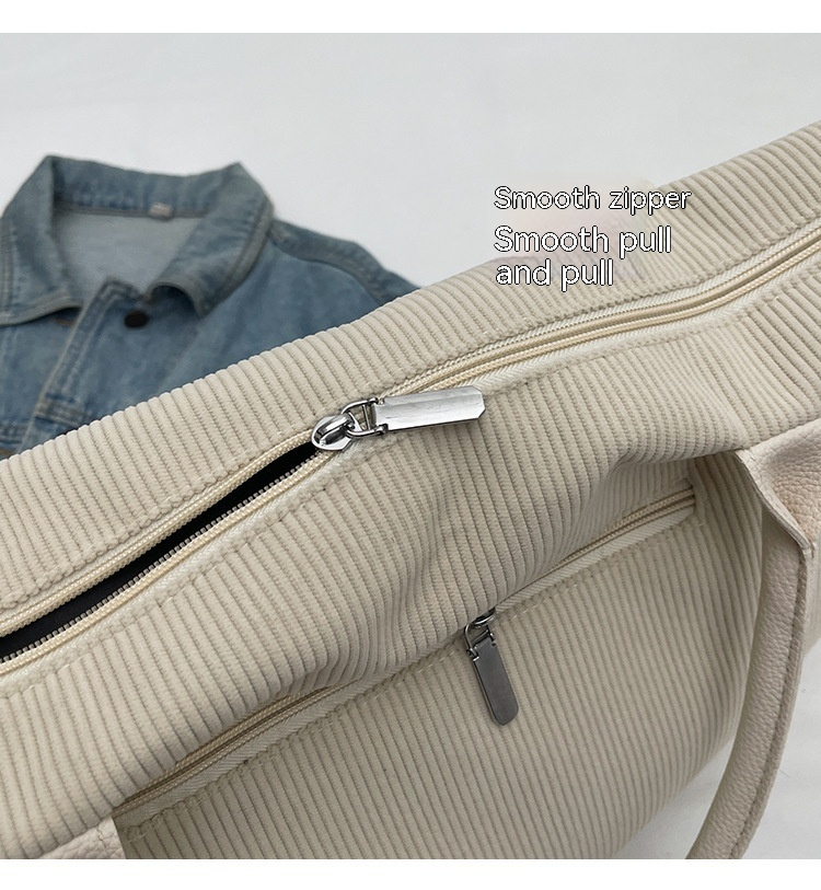 Borsa da viaggio a spalla singola per pendolarismo di grande capacità, design di nicchia, casual e versatile, semplice e alla moda, in velluto a coste, per donna_voghion.com