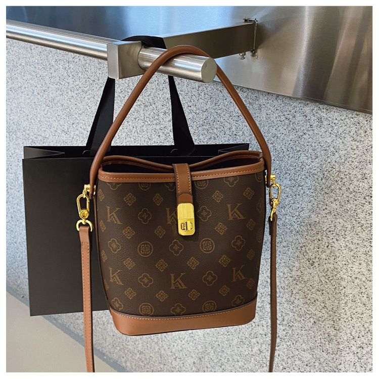 Tendenza di quest'anno: borsa a secchiello leggera e lussuosa stampata per le donne, nuova borsa alla moda 2025, borsa a tracolla versatile_voghion.com