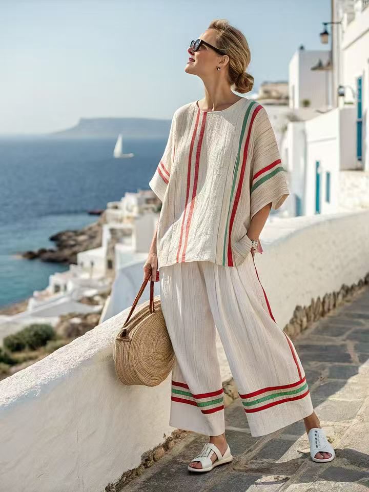 Completo due pezzi in cotone e lino con camicia a maniche corte e pantaloni, modello Island Vacation, modello ampio con scollo rotondo e pantaloni a vita alta_voghion.com