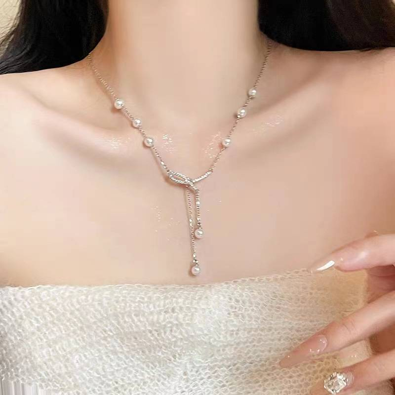 Collana in acciaio al titanio con fiocco, perla, nappa, clavicola, temperamento, jolly, nicchia, perline, catena per maglione, accessori, gioielli_voghion.com