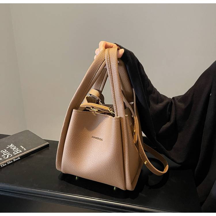 Zweiteilige, weiche Schultertasche mit Litschi-Muster für Mütter im Außenhandel. Neue, lässige, einfache, tragbare diagonale Tasche für das Leben._voghion.com