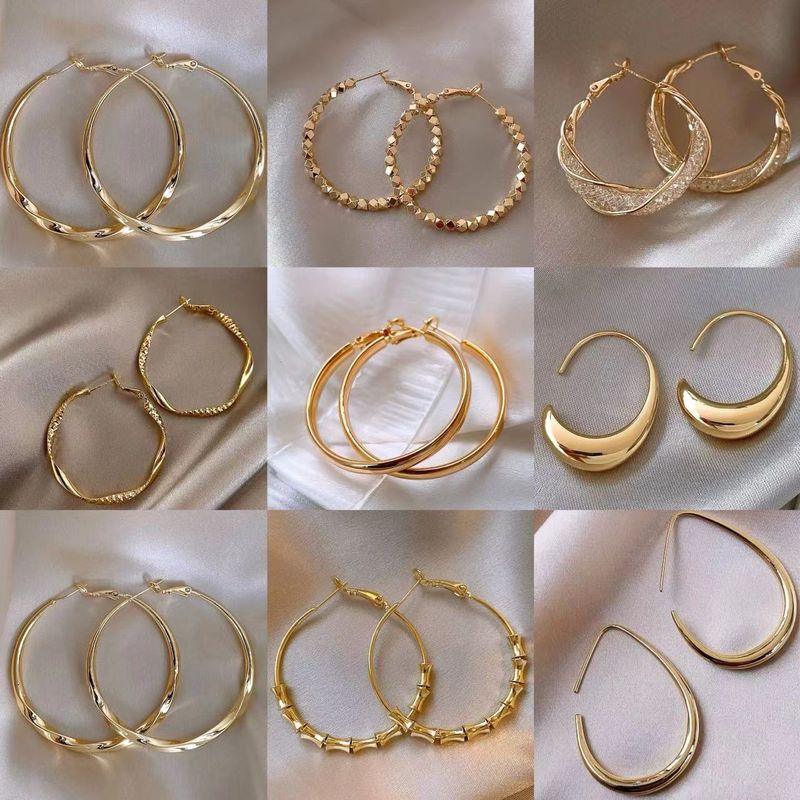 Ago d'argento Metallo Vento Circolare Geometrico Moda Pendolarismo Semplicità Semplice Cerchio Personalizzato Temperamento Di Alta Gamma_voghion.com