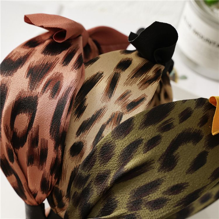 Leopard print rabbit ears knotted wide version headband female European and American going out disc hair card headband jewelry_voghion.com