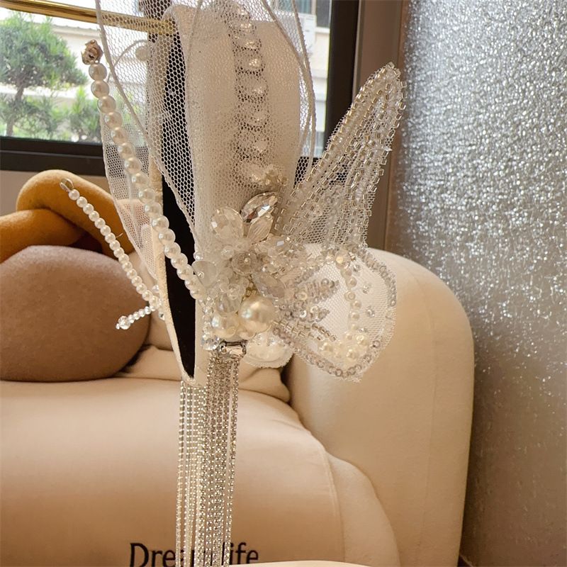 Fascia per capelli francese con ali di farfalla dolce, versione coreana, nuovo prodotto con nappa e forcina di strass, elegante fata_voghion.com