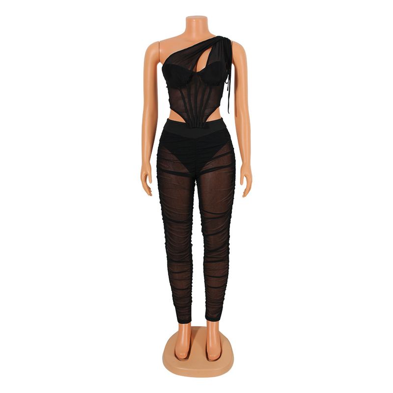 Completo due pezzi da donna con top irregolari trasparenti in rete sexy_voghion.com