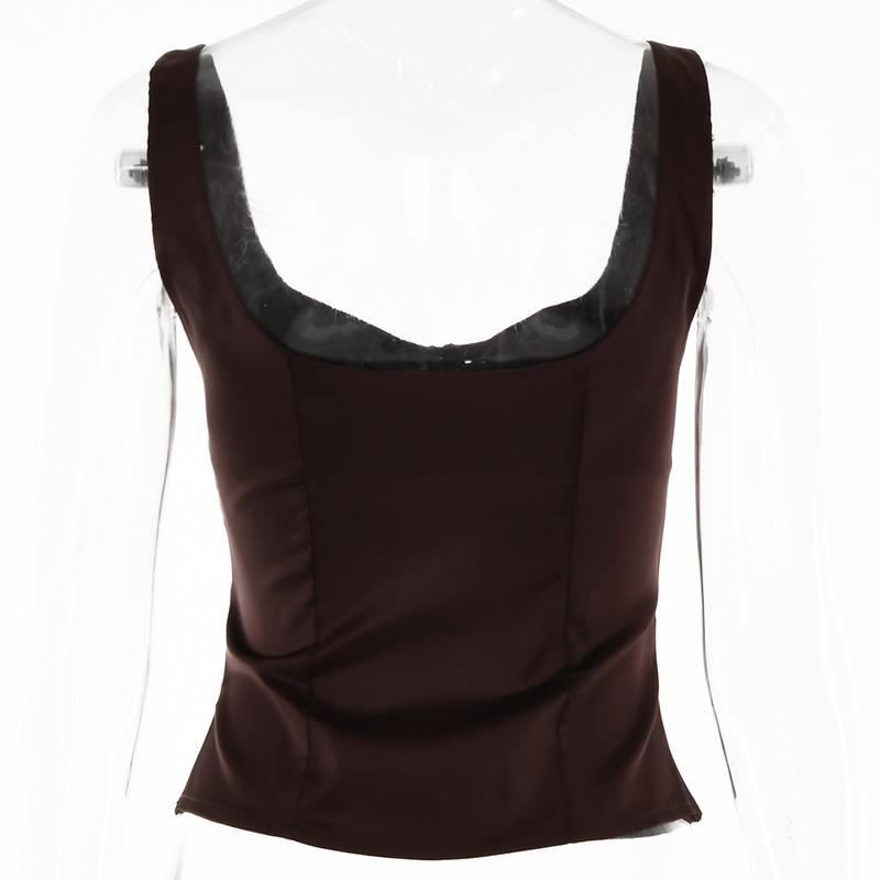 La camicetta da donna con colletto quadrato, cavezza, bottoni, senza maniche, senza schienale, può essere coperta con un gilet_voghion.com