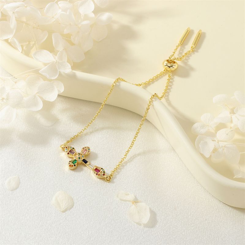 Bracciale minimalista a croce per donna placcato in rame con zirconi, regolabile, gioiello_voghion.com