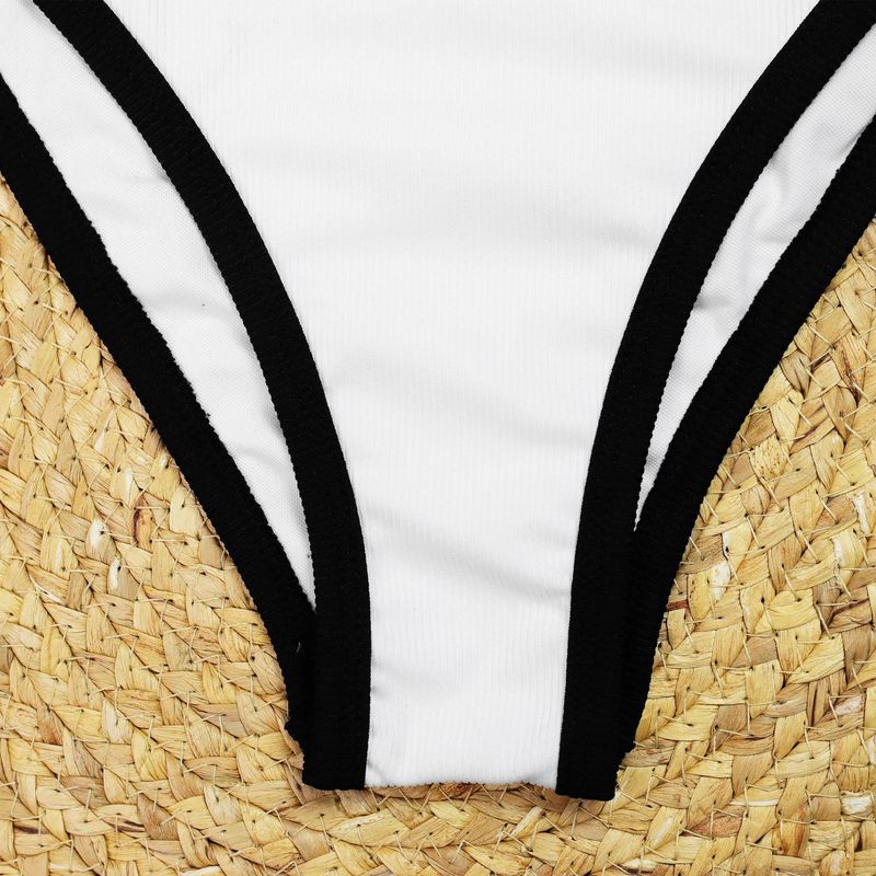 Maillot de bain une pièce noir et blanc pour femme, style simple et haut de gamme, avec petit parfum et boutons décoratifs_voghion.com