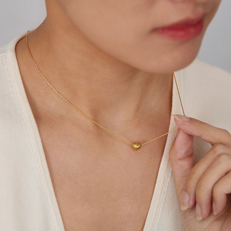 Collana da donna in stile pendolare, con ciondolo a forma di cuore, in acciaio inossidabile, semplice e versatile, placcato oro._voghion.com