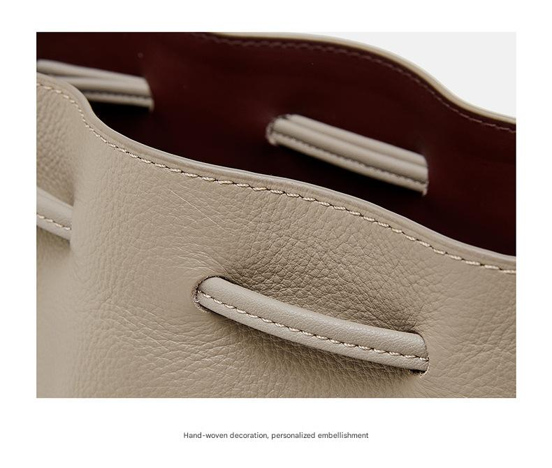 KOSE High-grade First-layer Cowhide Bucket Bag New Genuine Leather Women's Bag Tassel Niche Drawstring Shoulder Messenger Bag_voghion.com