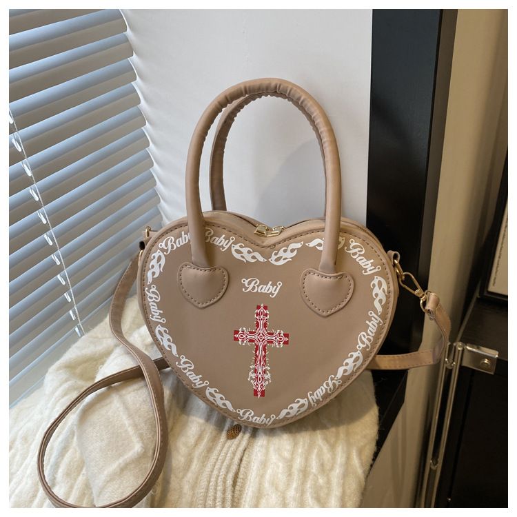 Borsa da donna personalizzata Rivet Punk Dark 2024 Nuova borsa a forma di cuore, borsa a tracolla incrociata, borsa a tracolla per donna_voghion.com