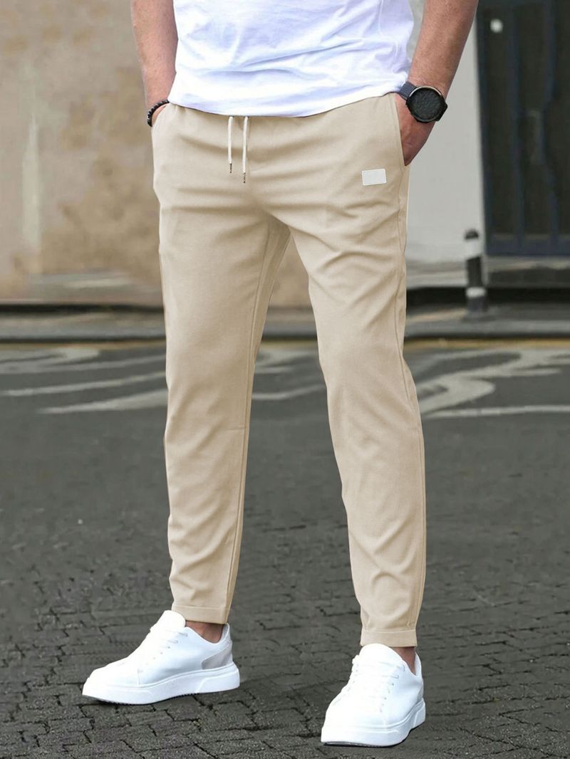 Pantaloni casual slim fit da uomo - Tinta unita, design a nove punti, dettaglio etichetta in pelle, comodi pantaloni con tasche_voghion.com