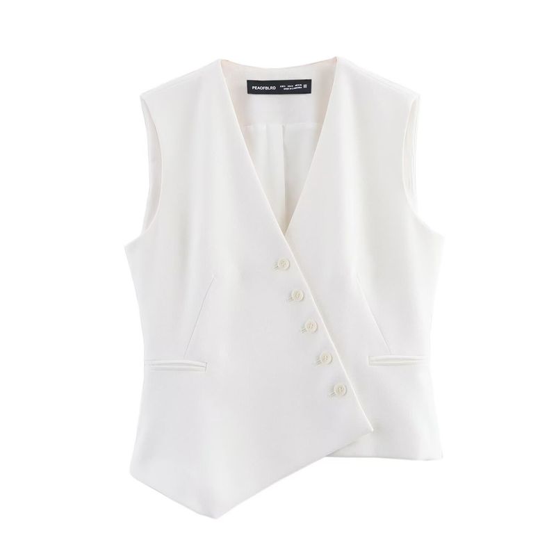Traje de mujer de moda con chaleco asimétrico sencillo con cuello en V y pantalón ancho plisado._voghion.com