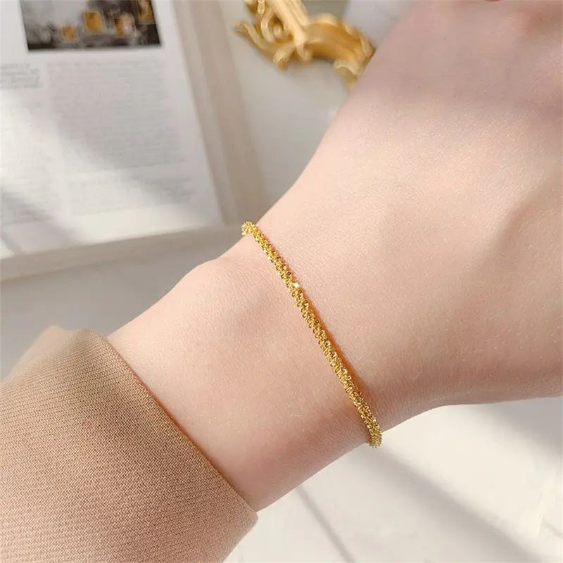 Bracciale stellato scintillante design di nicchia senso Internet celebrità lucida catena twist gioielli in acciaio al titanio e oro a mano_voghion.com