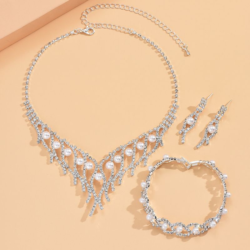 2022 Nuovi gioielli da sposa, orecchini cavi, collana di perle, set di due pezzi, accessori per abiti da sposa per le donne_voghion.com